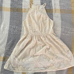 Off white cream dress never worn. Unsure of size xs/s